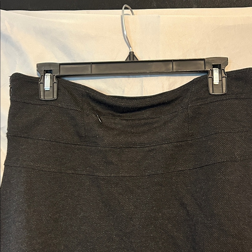Athleta Black Mini Skirt (No Shorts) Zipper. Size 8 Fixed slight hole (Pictured) - Picture 9 of 11
